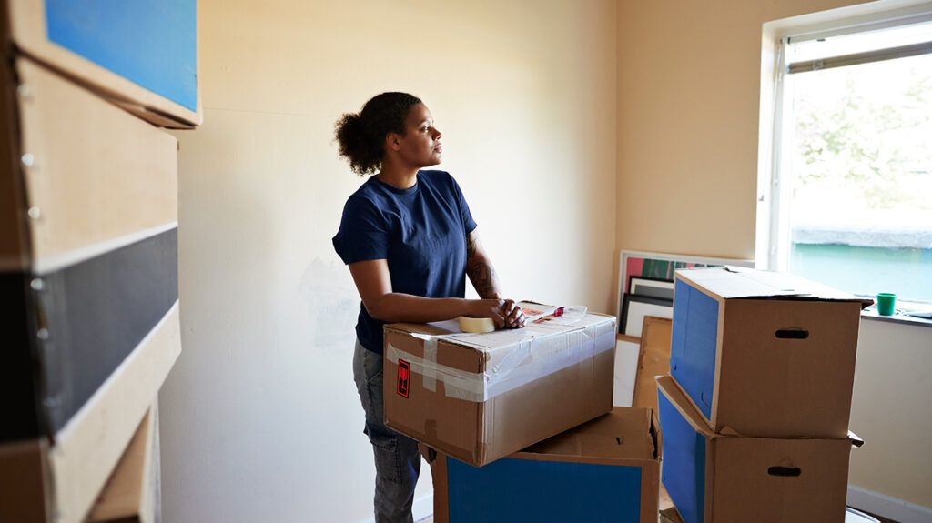 woman with moving boxes